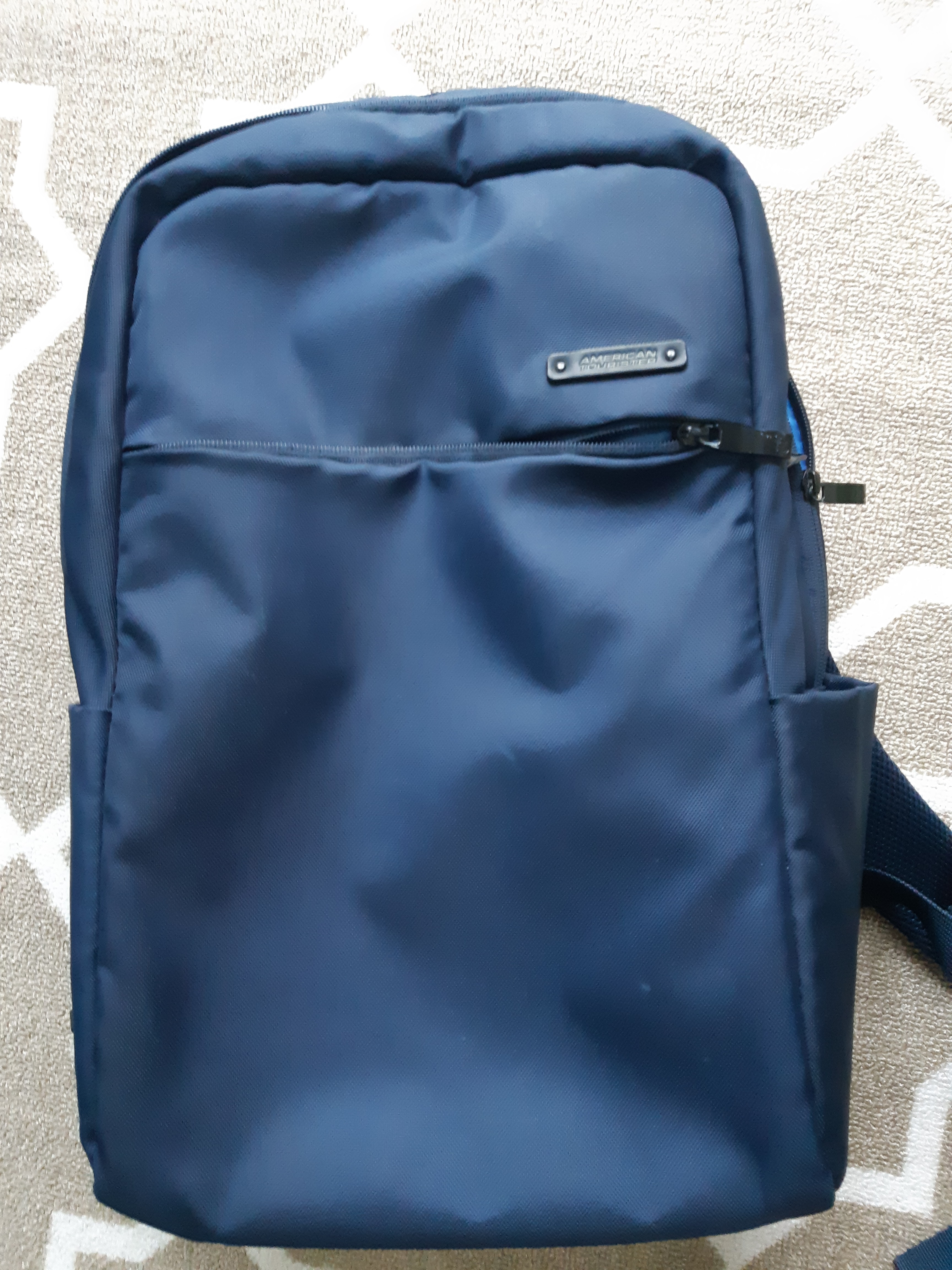 mens blue backpack