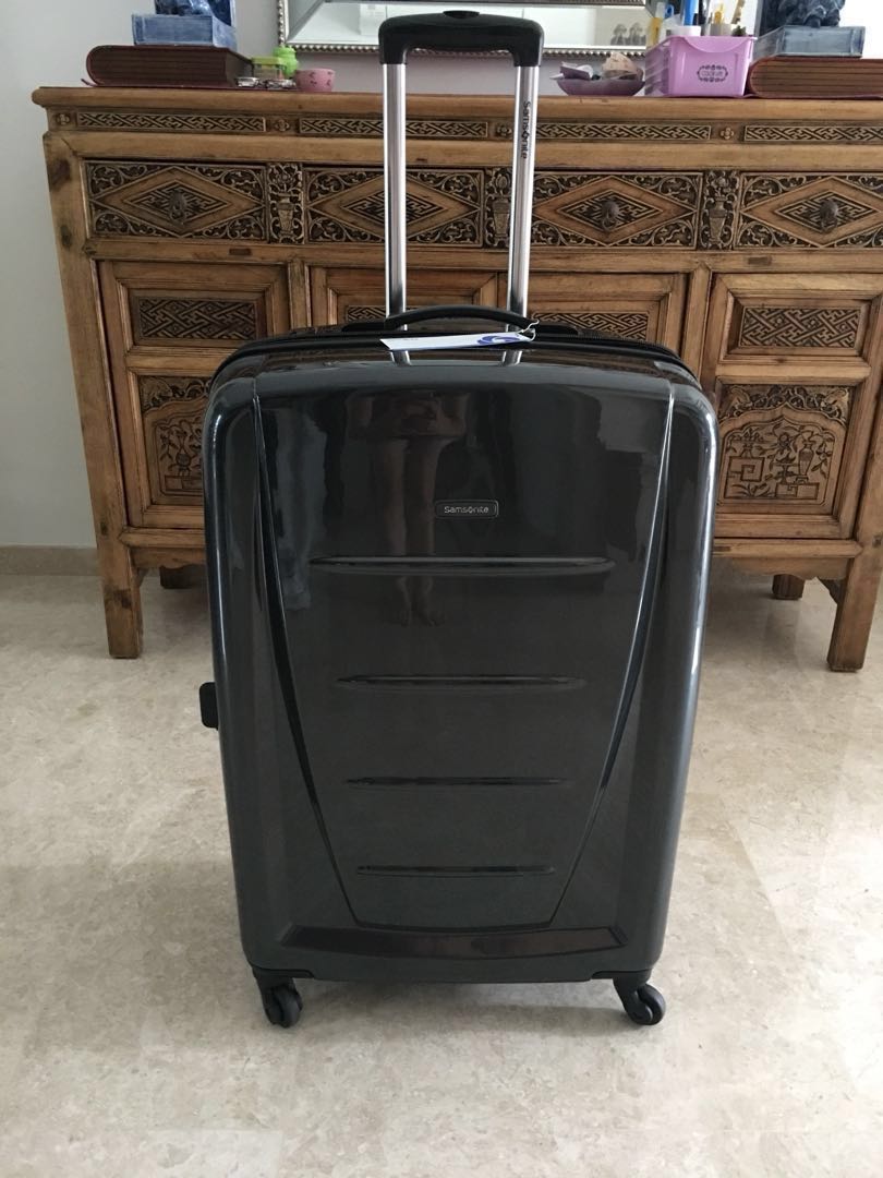 Samsonite sigma 76cm expandable spinner weight clearance