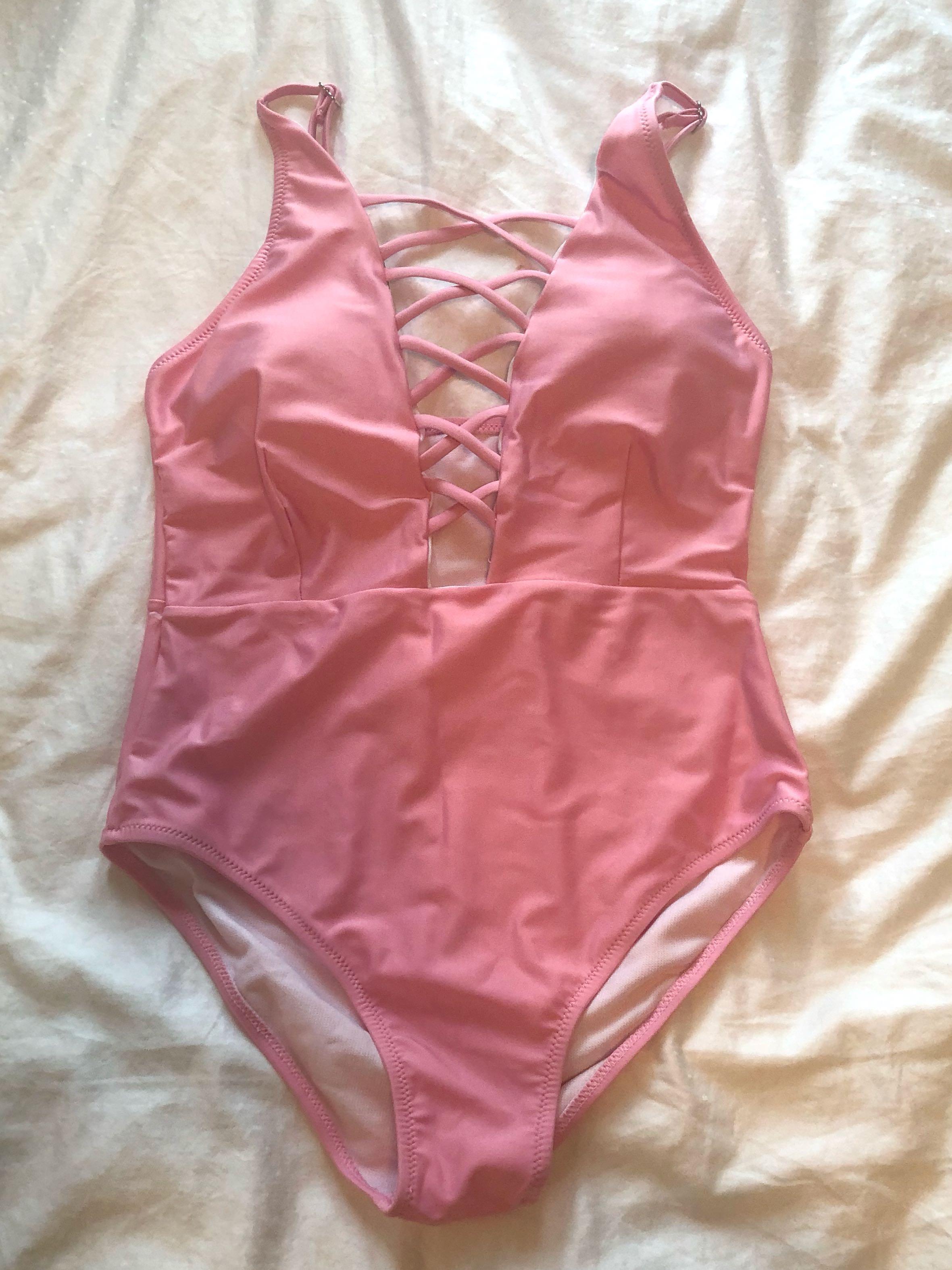 Baby Pink one-piece bathing suit (Category: Rash guard) located in Pasig City. Submitted by happy_sun (Listing ID 211819299, Image 1). Description: Used Once In very good condition SF c/o buyer MOP BDO .