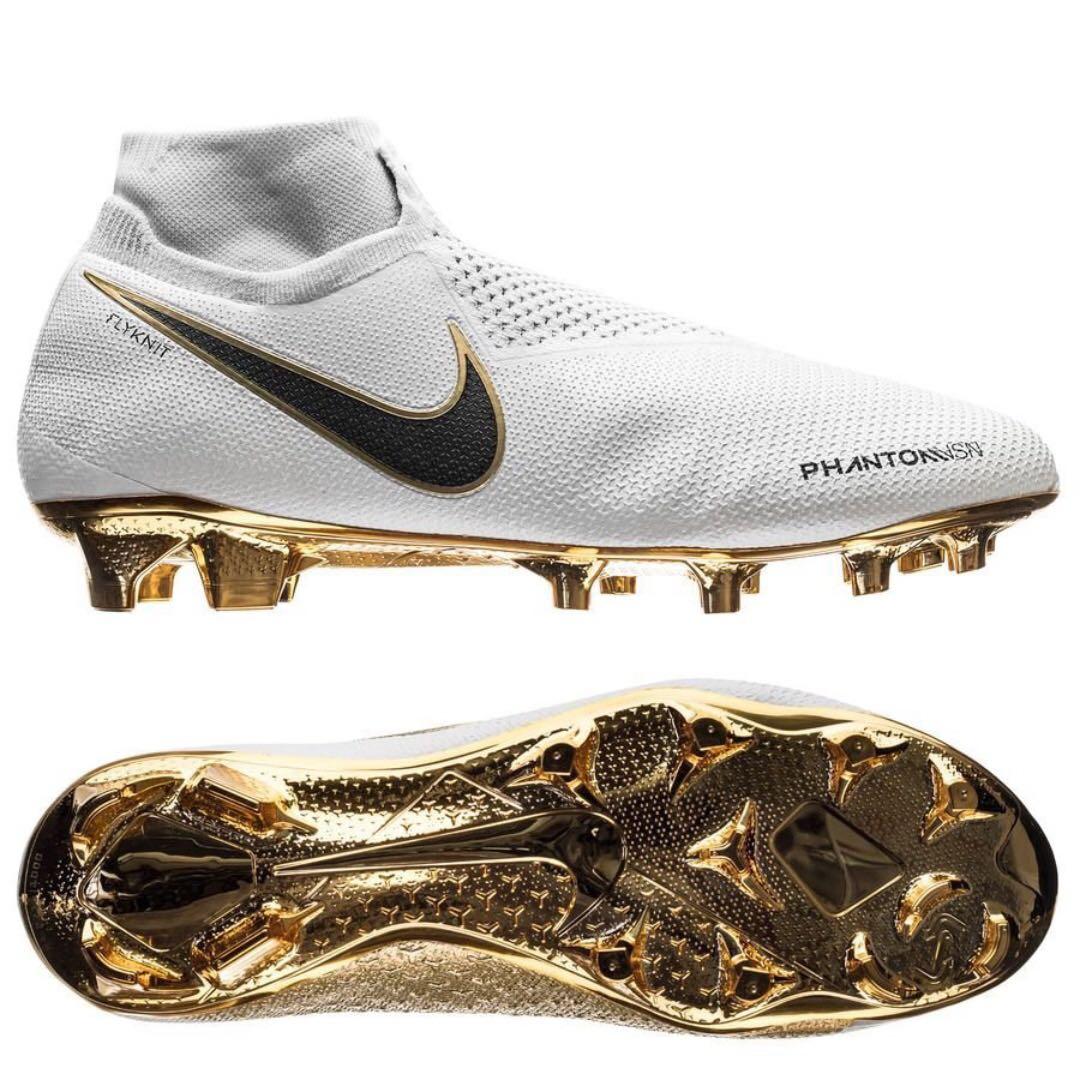 gold and black nike football boots