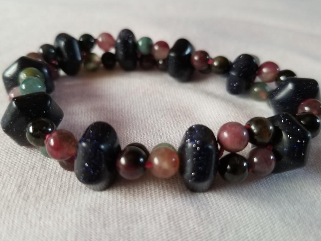 Preloved 2 pcs -semi precious stones bracelets (Category: Bracelets) located in Cebu City. Submitted by anneny (Listing ID 211867686, Image 2). Description: Selling preloved garterized bracelets with multi colored semi precious stones. Fits small to meduim wrists.