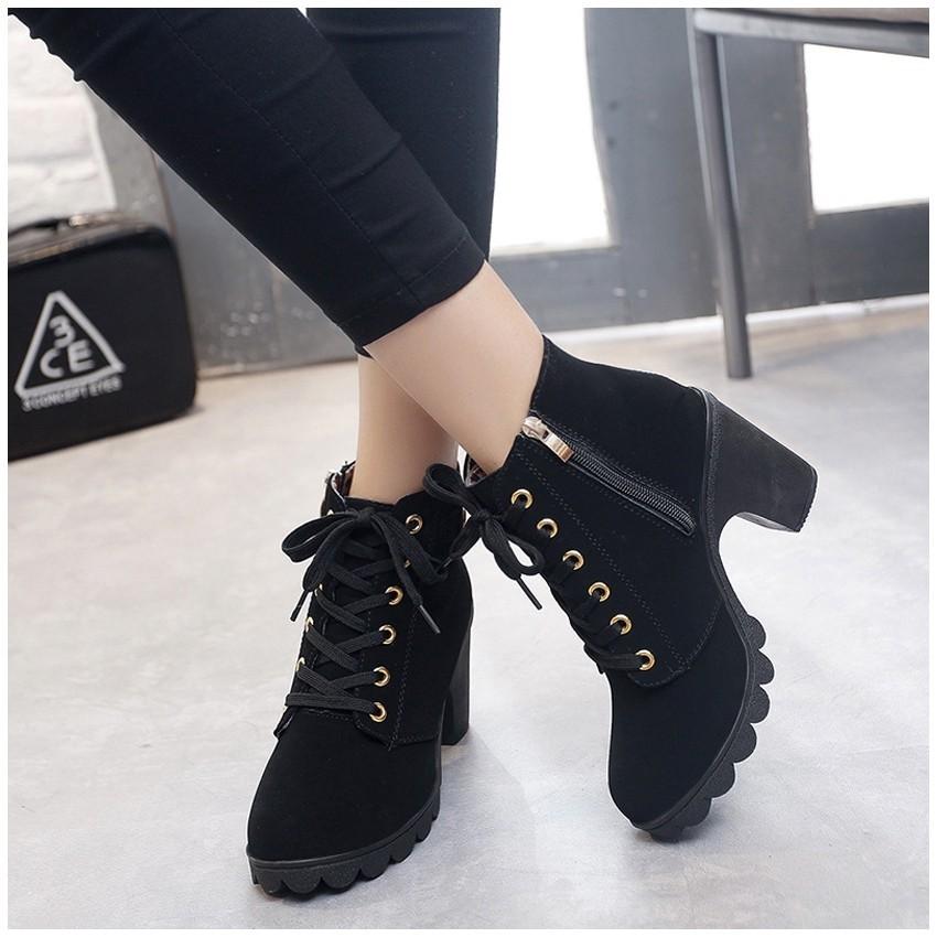 Dr martens best sale high heel boots