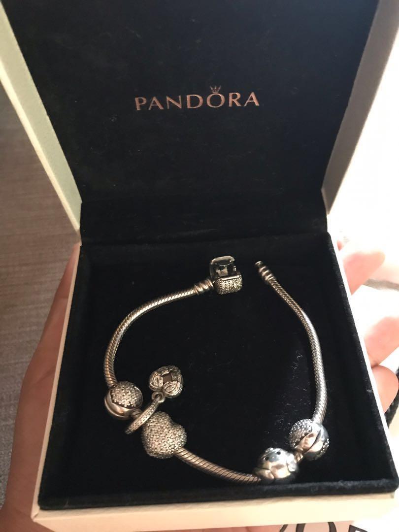 Pandora Bracelet (Category: Luxury Accessories) located in Pasig City. Submitted by the_fetch_side (Listing ID 204903962, Image 1). Description: Authentic Pandora Bracelet and Charms Worn twice only! Size 18 Overall orig price is 20k plus Selling for a very low price because my sister had outgrown this style. 💋💋😘🌸 Will include the box and the paper bag. Slightly negotiable! .