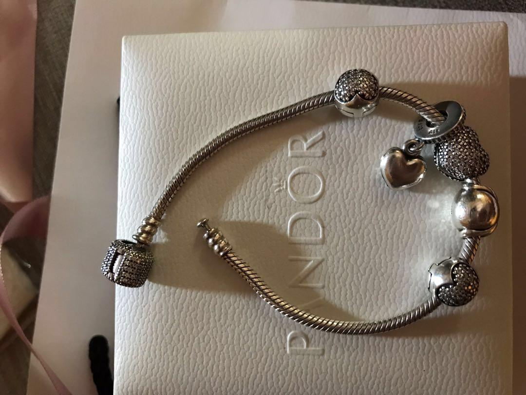 Pandora Bracelet (Category: Luxury Accessories) located in Pasig City. Submitted by the_fetch_side (Listing ID 204903962, Image 2). Description: Authentic Pandora Bracelet and Charms Worn twice only! Size 18 Overall orig price is 20k plus Selling for a very low price because my sister had outgrown this style. 💋💋😘🌸 Will include the box and the paper bag. Slightly negotiable! .