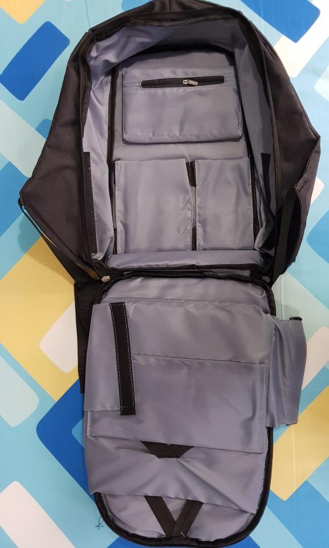 Backpack (Category: Backpacks) located in Singapore. Submitted by patjoyi (Listing ID 212236462, Image 3). Description: Condition: 10/10 (Brand New) -Colour: Black -Selling it because I don't use -Contains Laptop Compartment and many other compartments for storage.