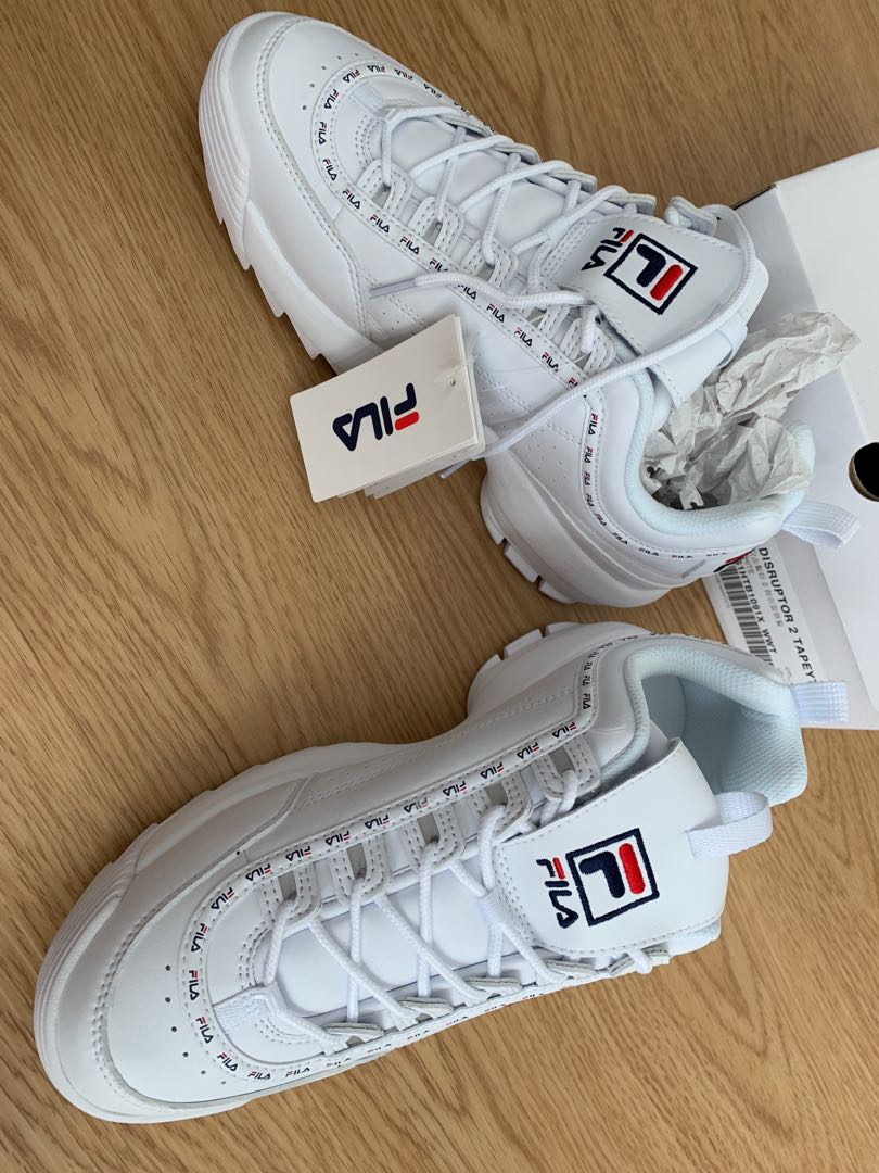 Real vs top fake fila disruptor