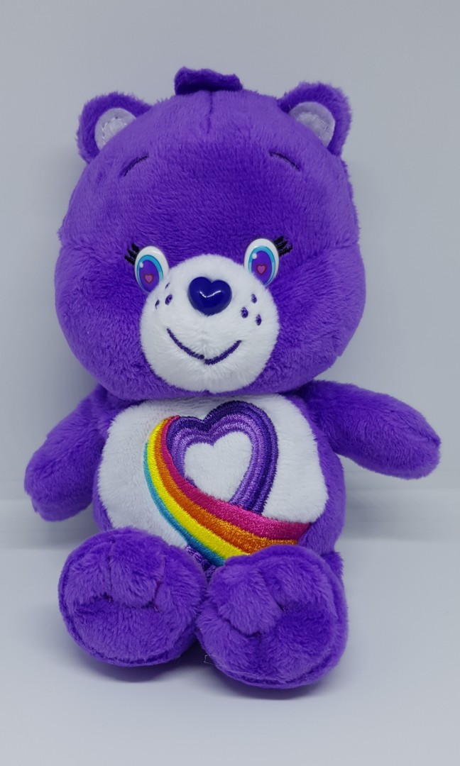 purple care bear with rainbow heart