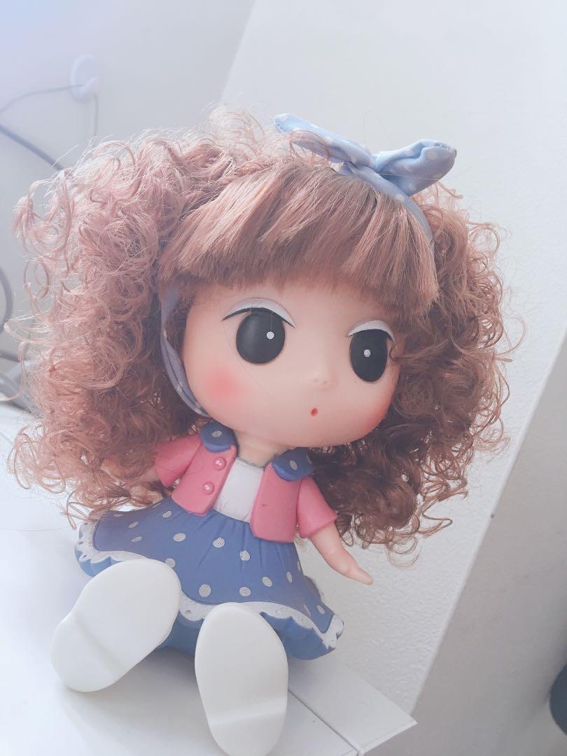 doll piggy bank