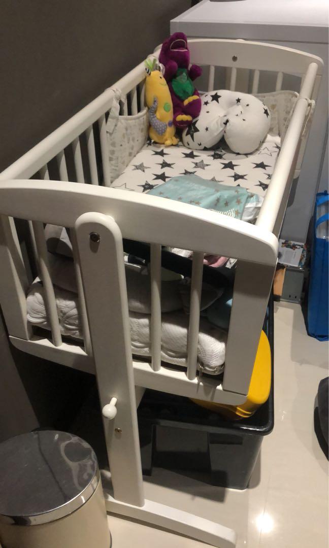 mothercare swinging crib mattress size