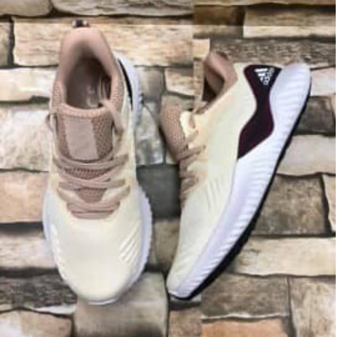 vapormax plus orange and pink