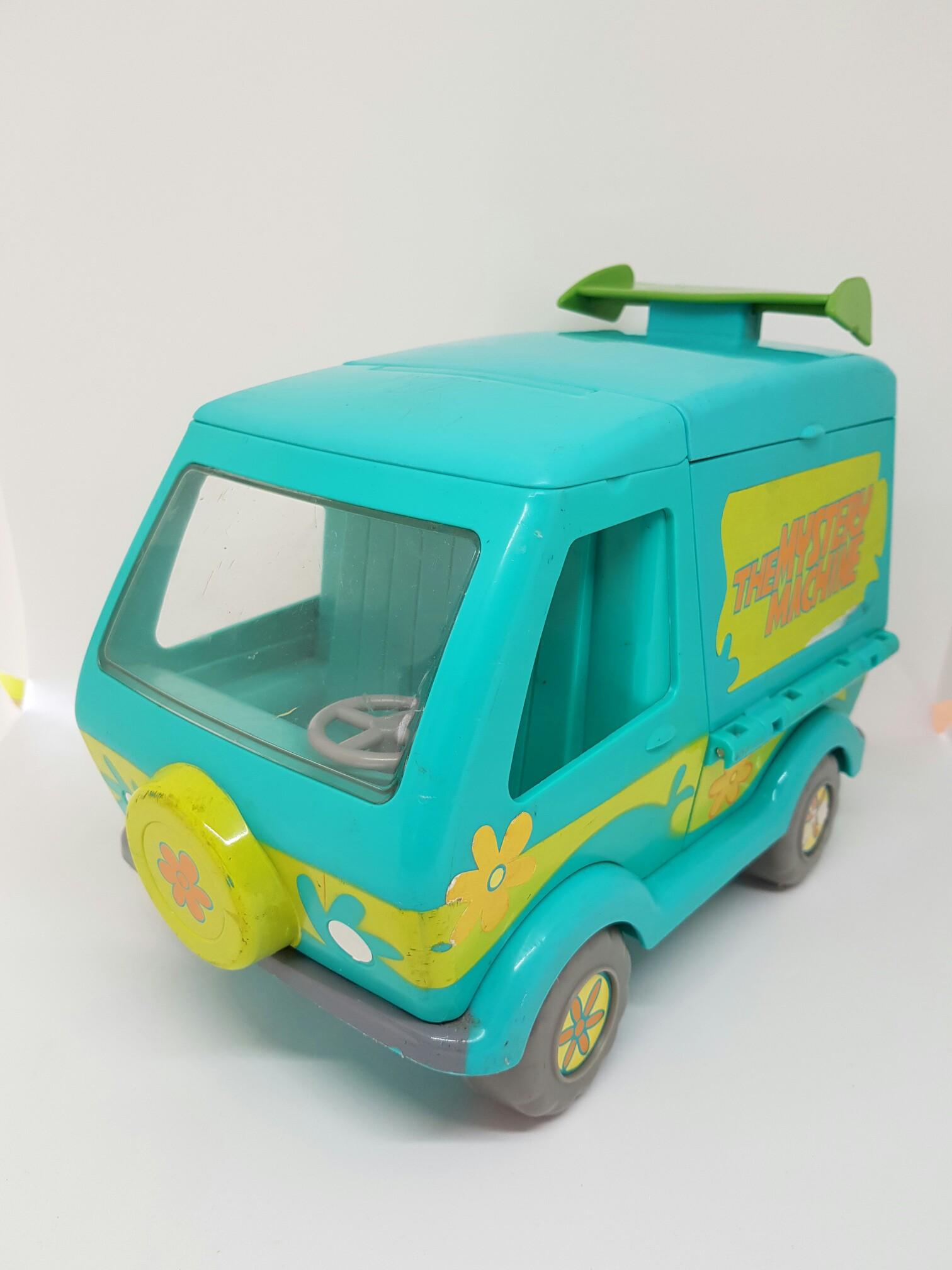 https://media.karousell.com/media/photos/products/2019/02/01/mystery_machine_scooby_doo_van_1548999801_26948e5a_progressive.jpg