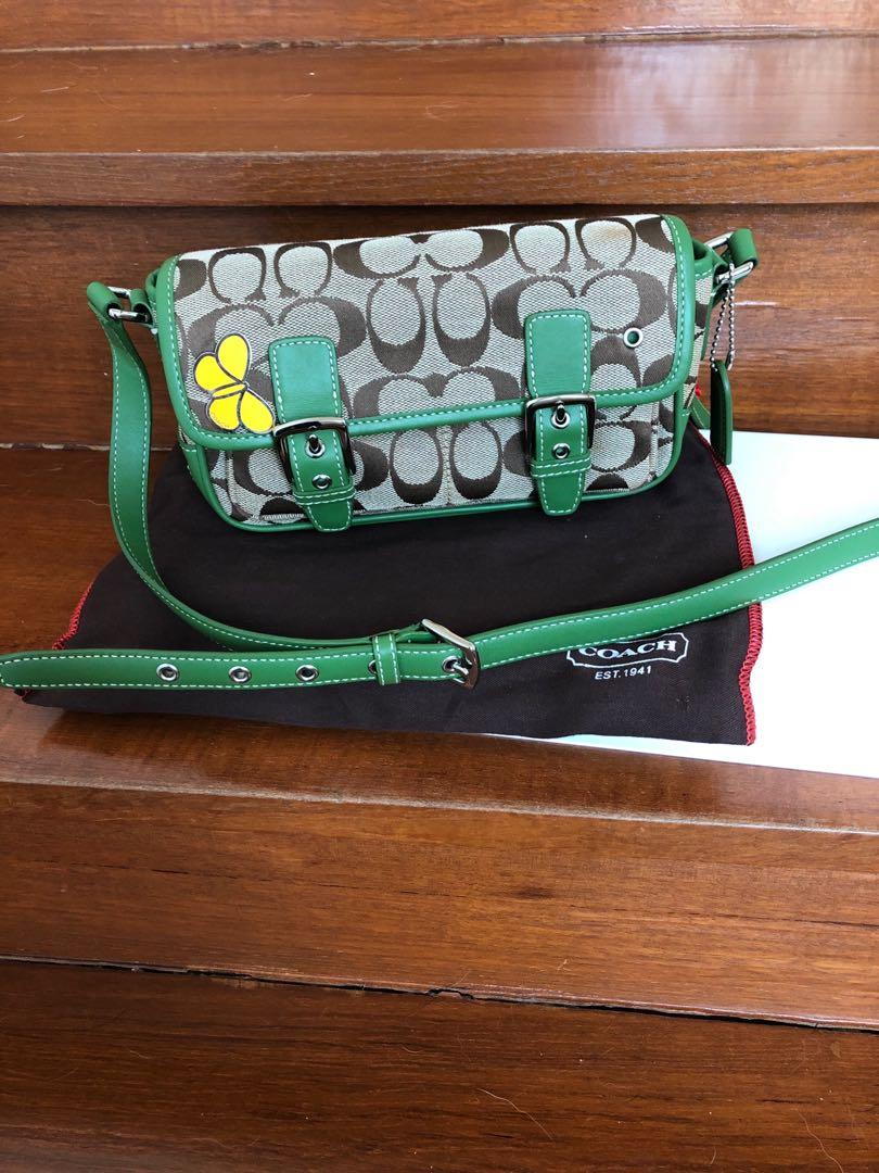 Coach crossbody mini bag with green leather trimmings and yellow butterfly pin. Women s Fashion Bags Wallets Cross body Bags on Carousell