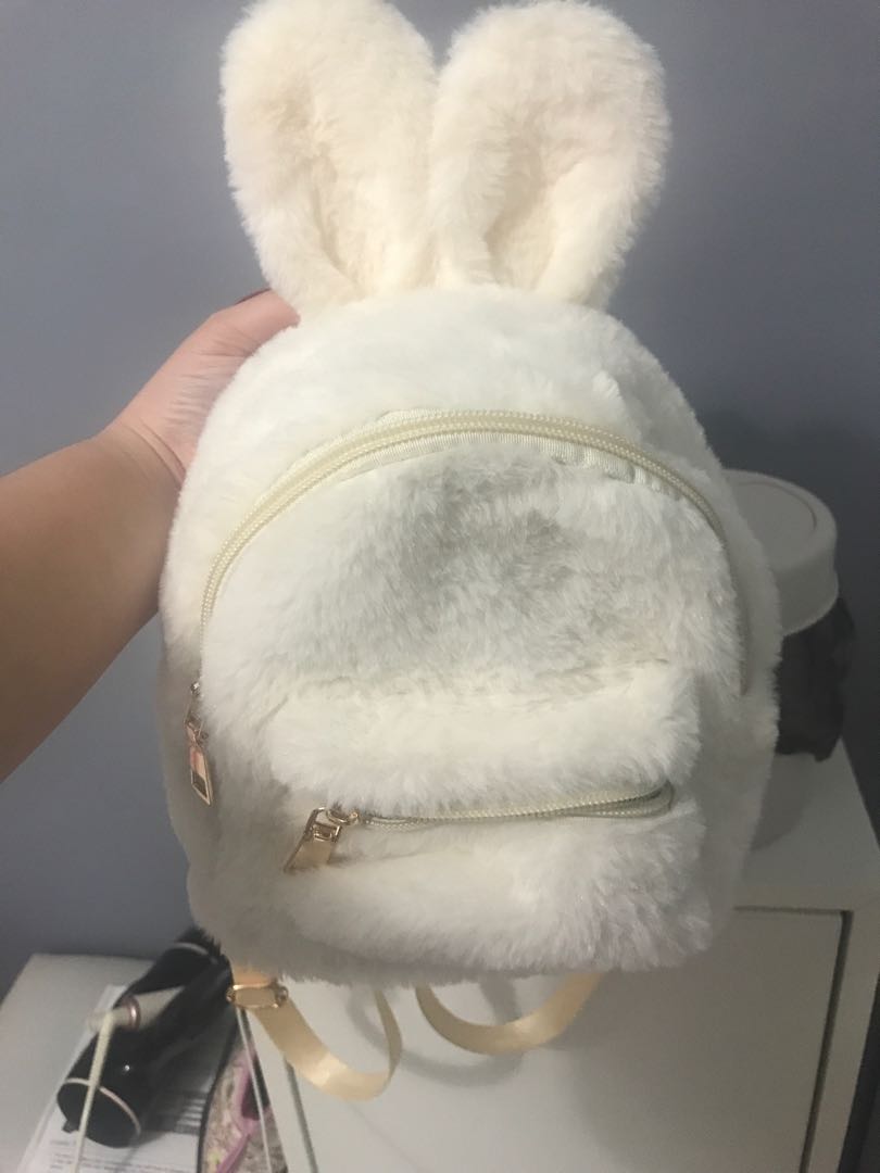 white rabbit backpack