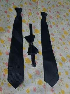 3 black ties and one black bow tie