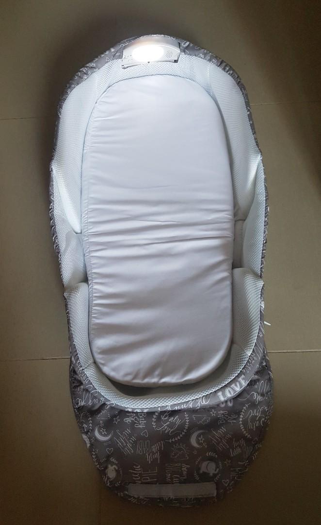 snuggle nest harmony portable infant sleeper