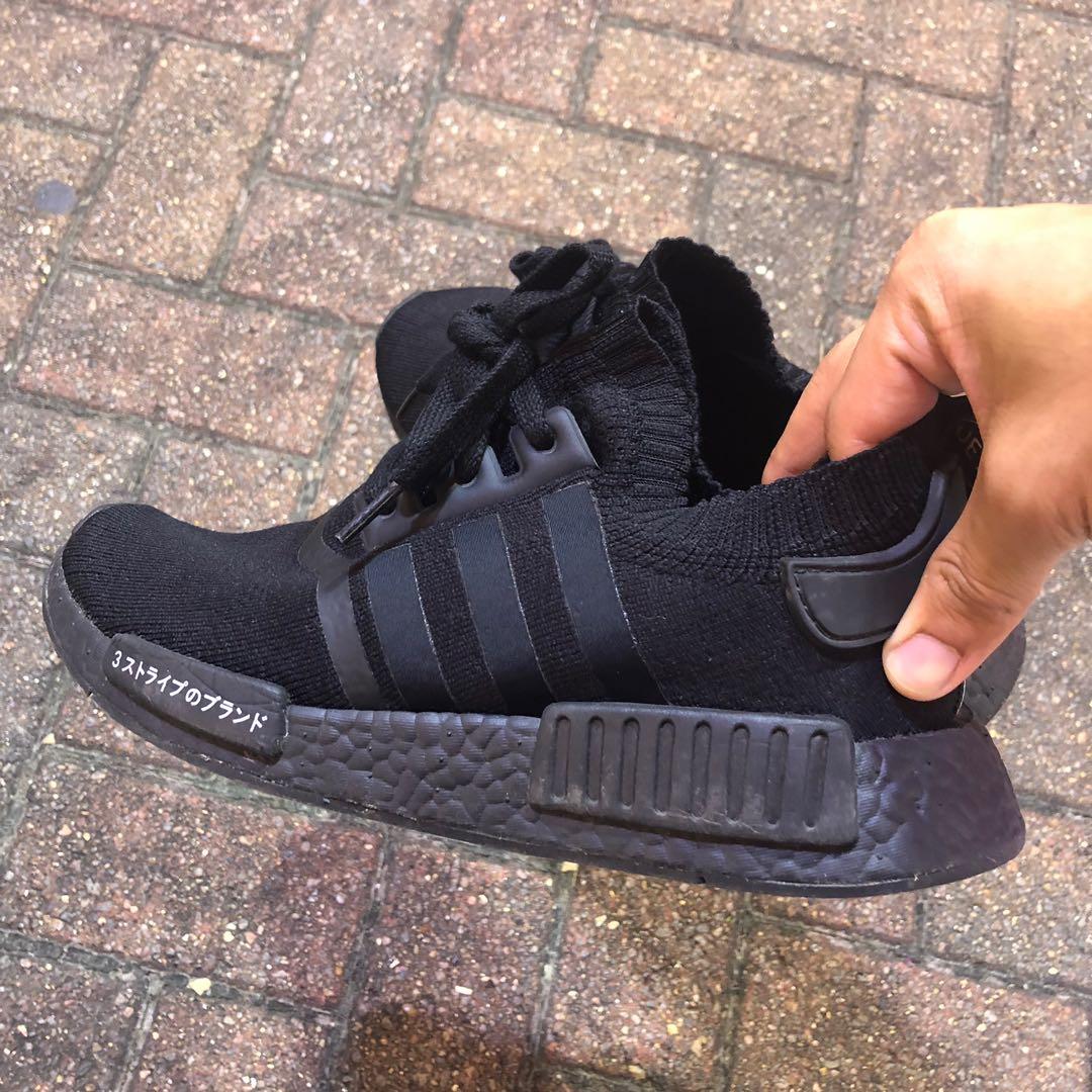 nmd r1 triple black primeknit