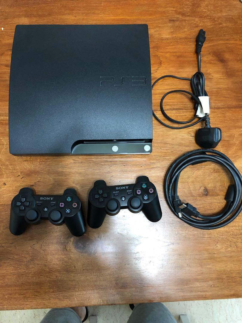 playstation 3 with 2 controllers