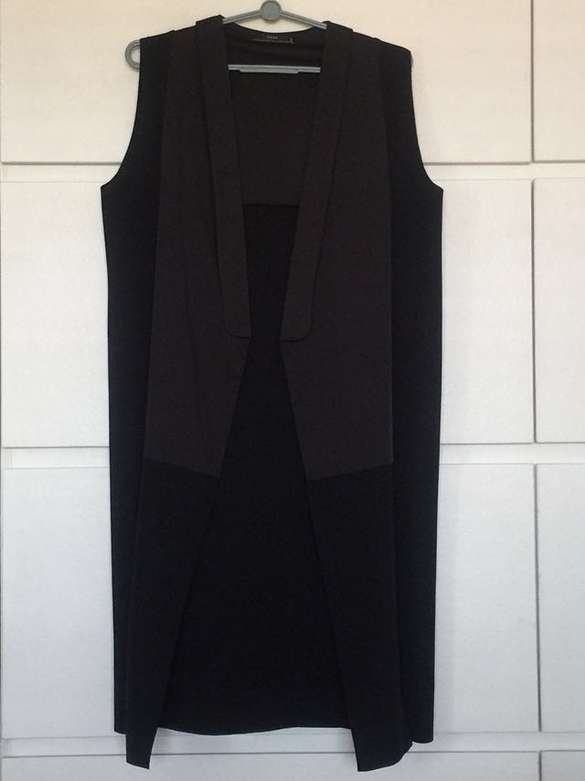 long black sleeveless vest