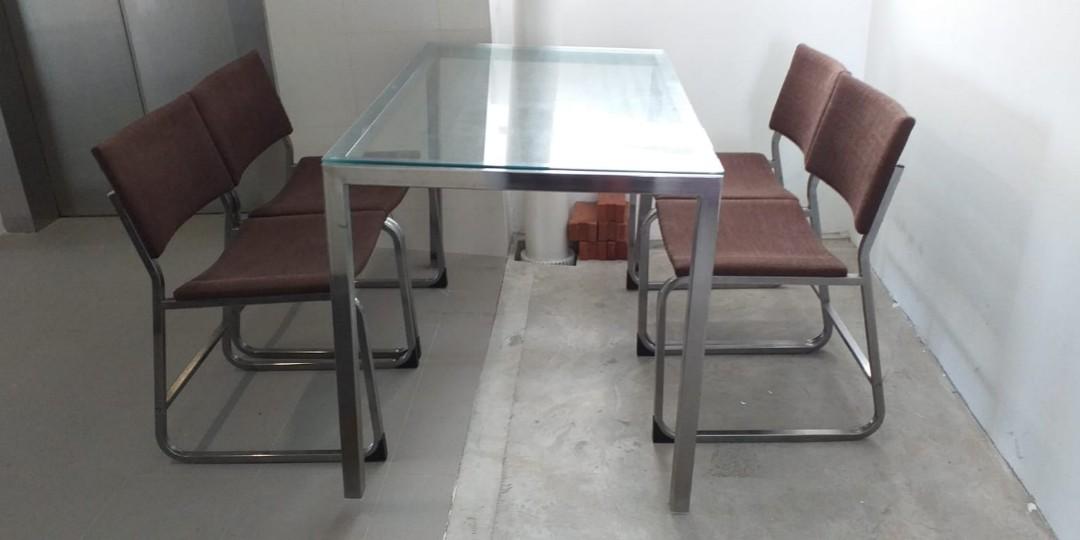 Dining Table Set (Category: Tables & Sets) located in Singapore. Submitted by kai3raja (Listing ID 213338803, Image 2). Description: 4 seater glass dining table with chair. Still in excellent condition.