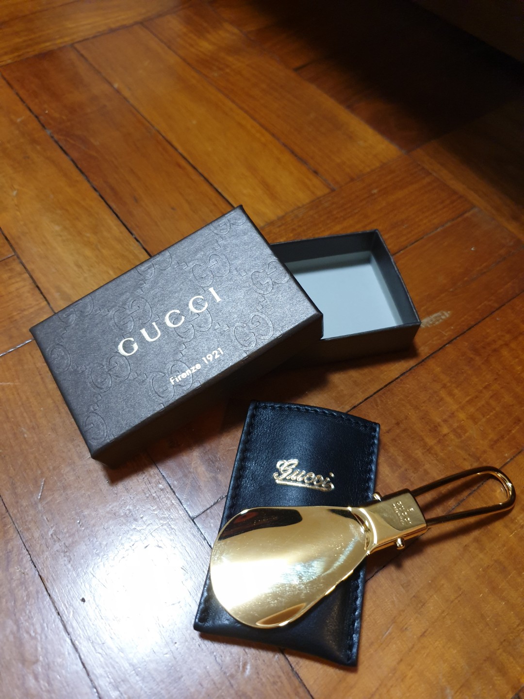 gucci shoe horn gold
