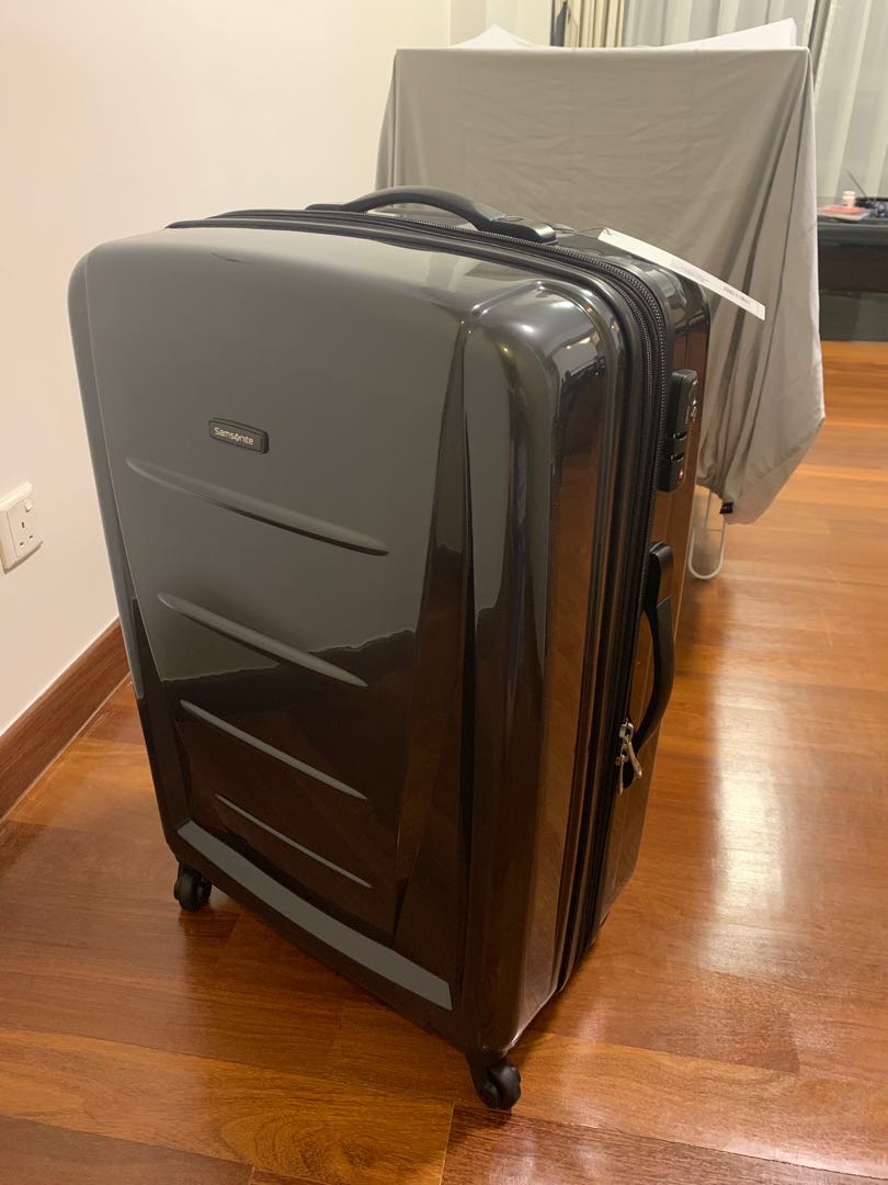 Samsonite sigma 76cm expandable hotsell spinner weight