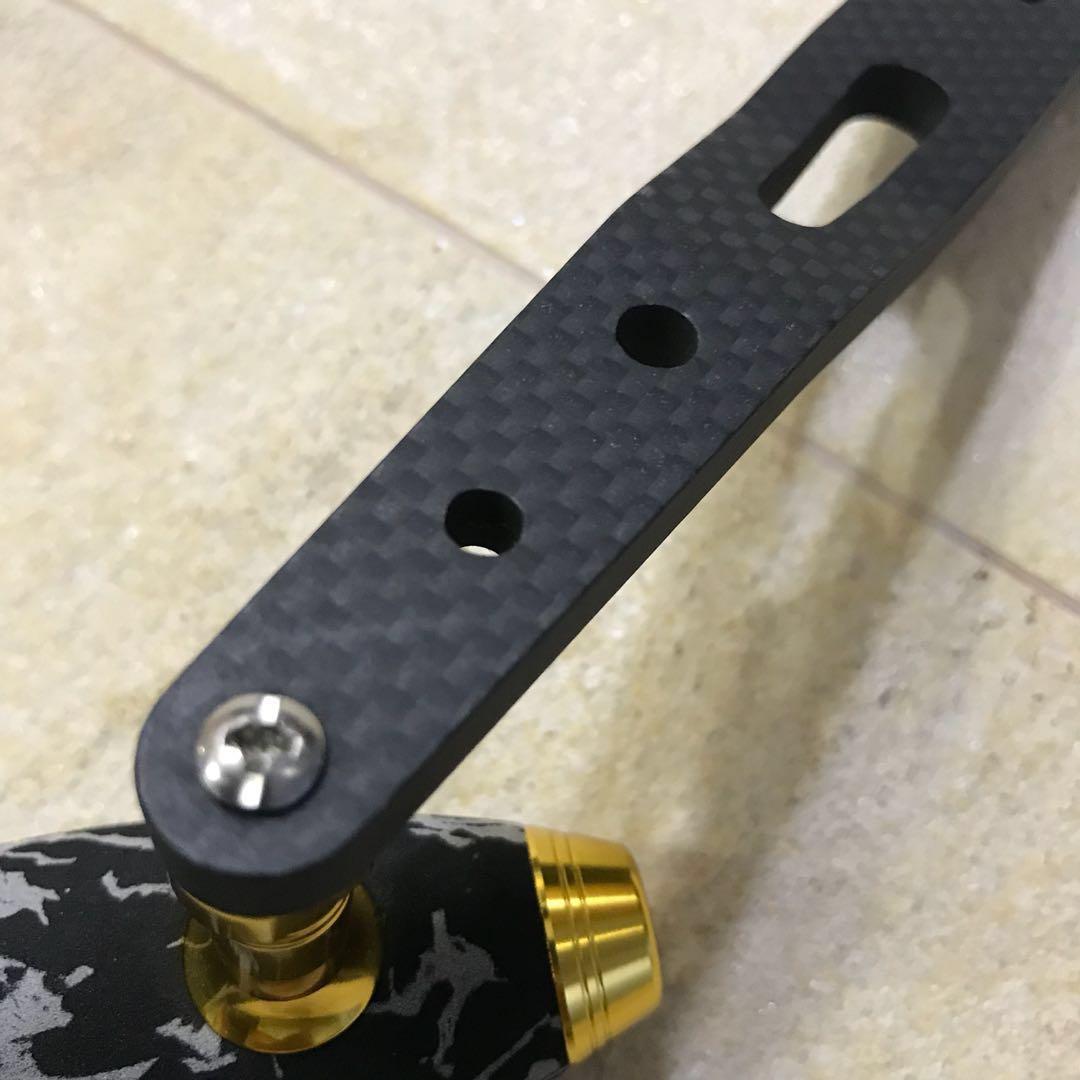 Jigging reel carbon fibre handle with Black camo knob