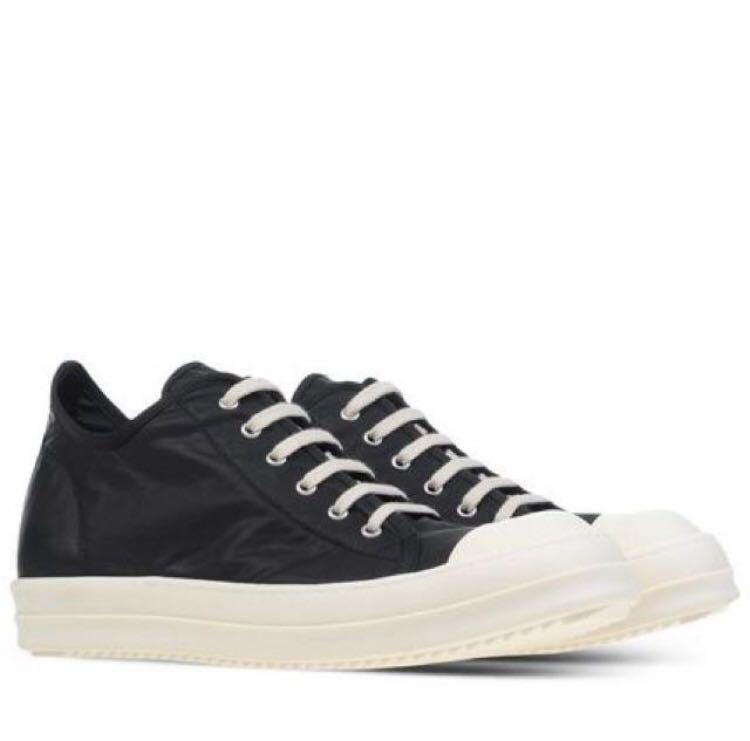 black leather low top trainers