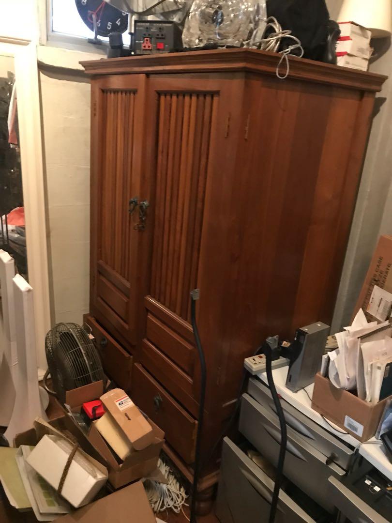 Solid Timber TV cabinet (Category: Shelves, Cabinets & Racks) located in Singapore. Submitted by sinnedts (Listing ID 213720185, Image 1). Description: Excellent condition Solid timber construction Fine detailing & workmanship Retails for over 1k .