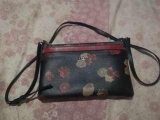 Coach floral sling