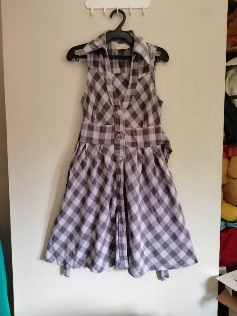 Checkered Dress (Category: Dresses) located in Taguig. Submitted by fruity_mint (Listing ID 214014478, Image 1). Description: Color: Shade of Gray Perfect for xs and small frame With belt Issue:Missing one button at the lowest part.