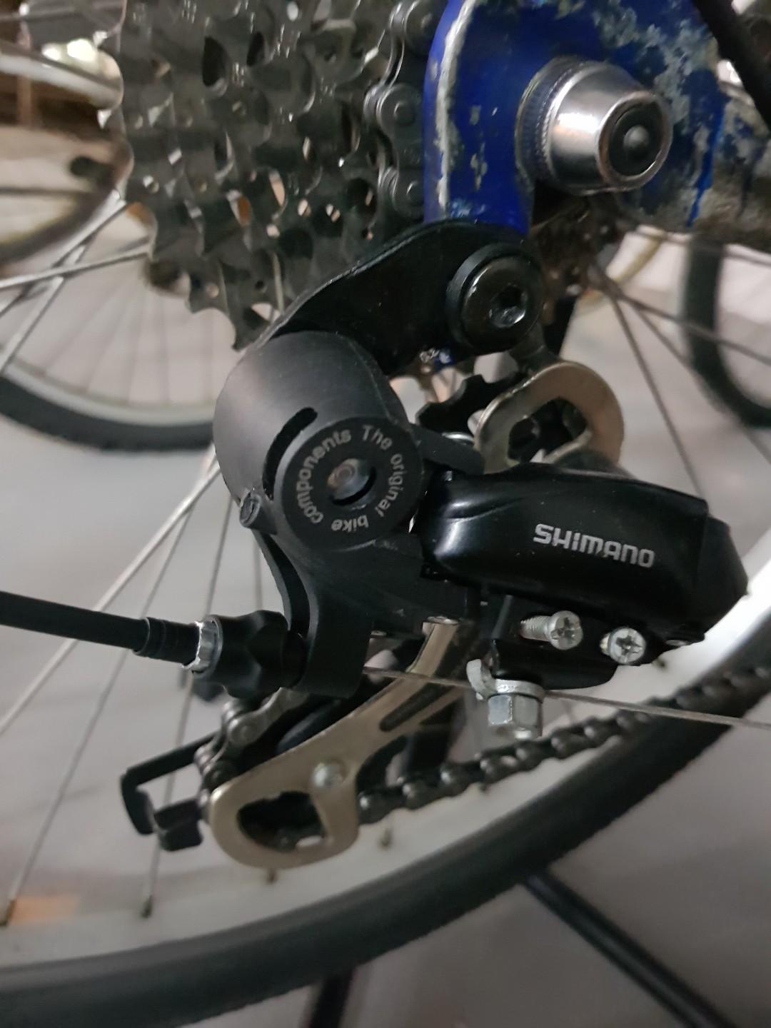 shimano tourney rear derailleur adjustment