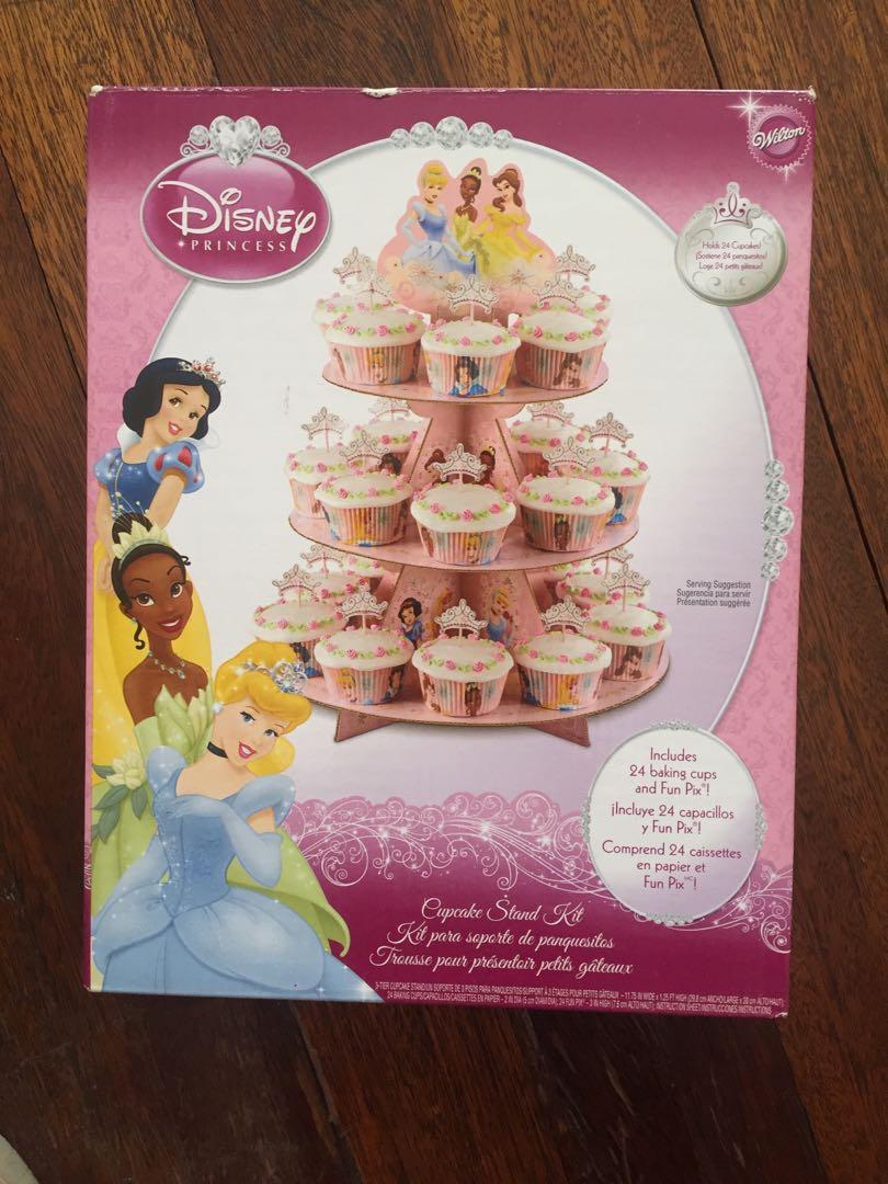Wilton Cupcake Stand Kit (Disney Princess) (Category: Bakeware) located in Manila. Submitted by candilicious14 (Listing ID 214017173, Image 1). Description: Wilton Cupcake stand kit Design: Disney Princesses Once used then stock in the cabinet 9/10 in excellent condition Complete accessories (the cupcake base and topper -not used) Last price posted .