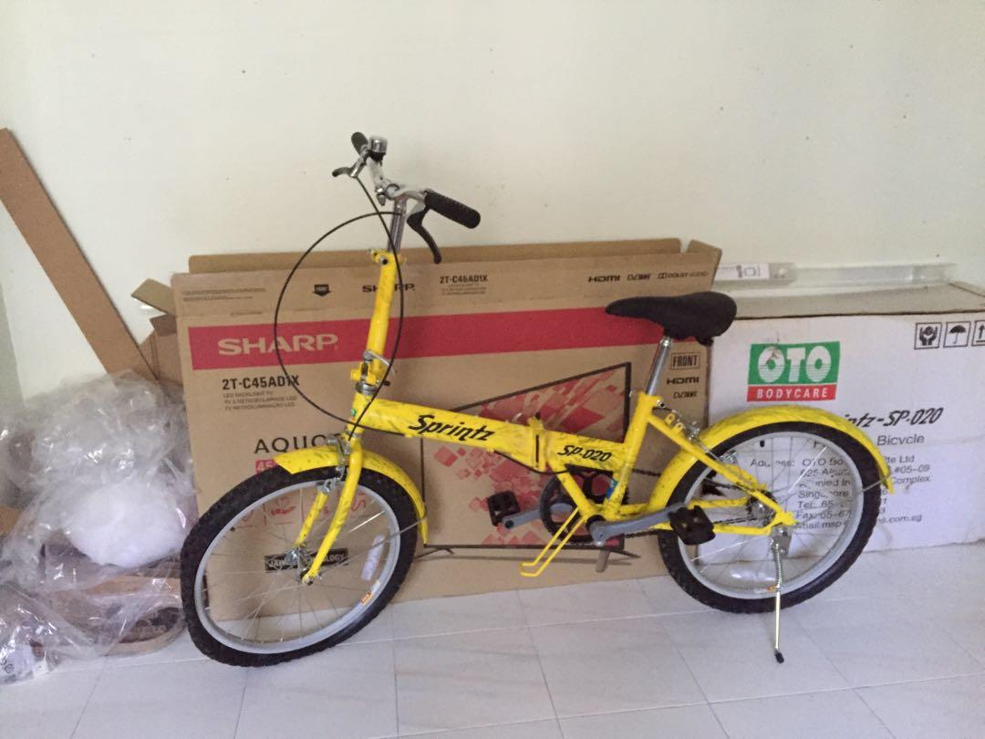 yellow folding bike