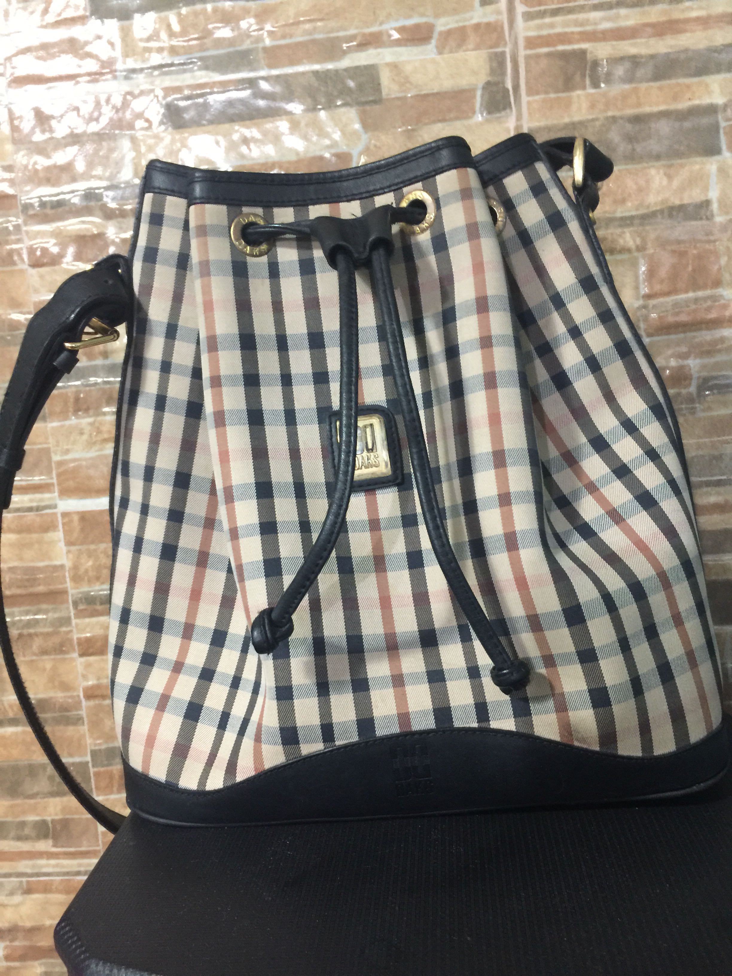 Daks bucket bag price sale