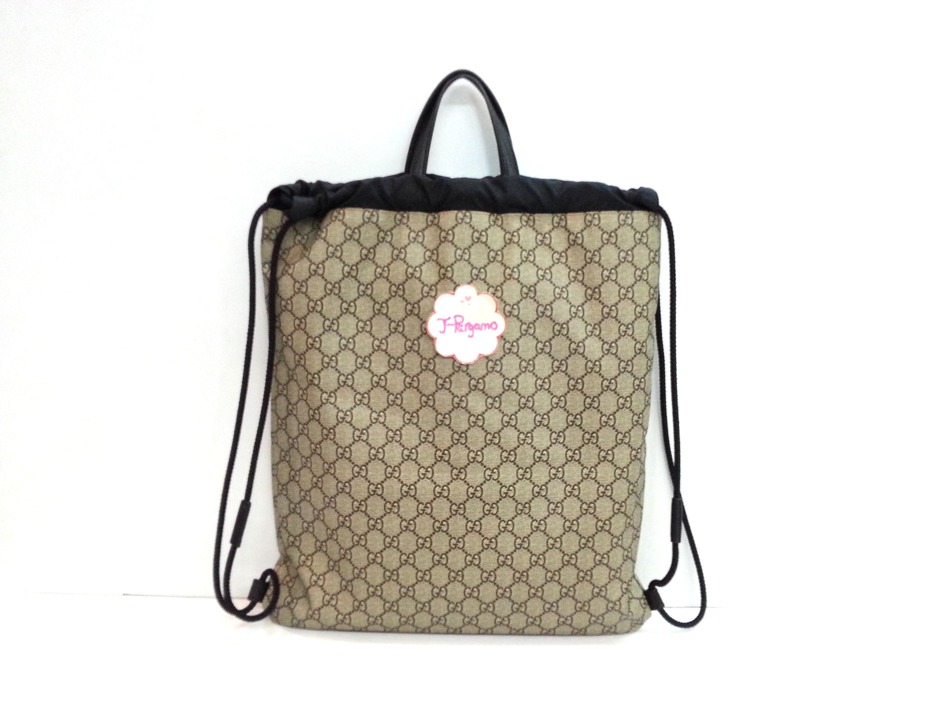 Authentic Gucci Angry Cat Soft GG Supreme Drawstring Backpack Only For Sale No Trade Fixed Price Non Neg Luxury Bags Wallets on Carousell
