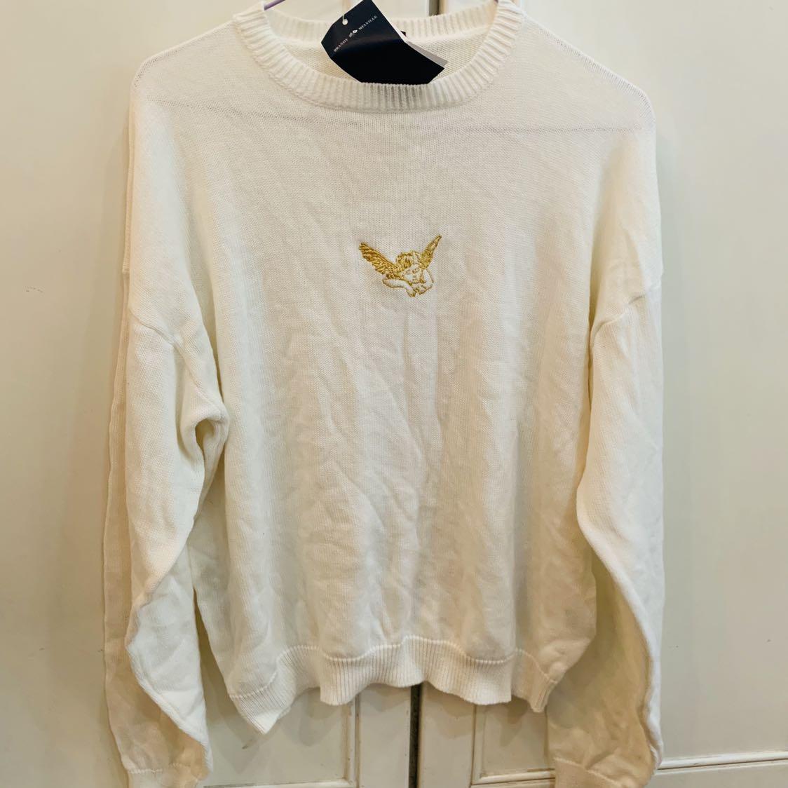 Bnwt brandy Melville graphic angel White knit pullover Sweater authentic bm Women s Fashion Tops Other Tops on Carousell