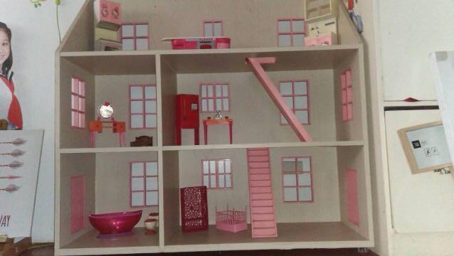 barbie doll and doll house