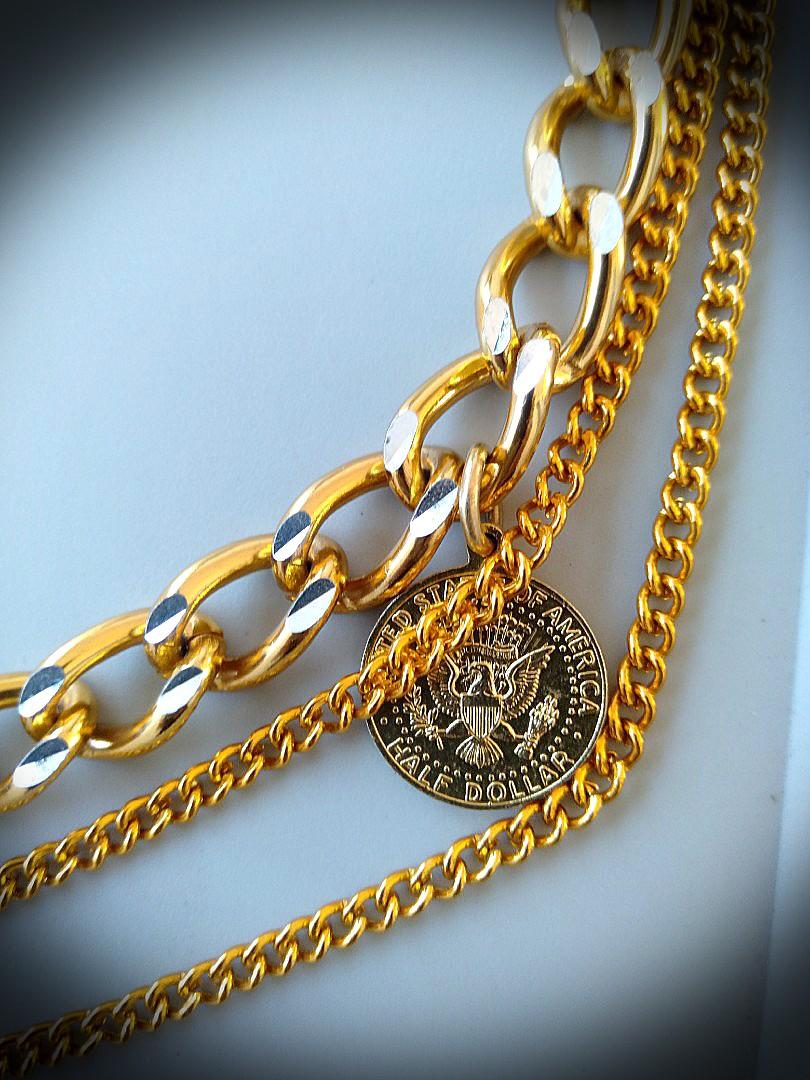 21k Gold tones Cuban hollow (Category: Luxury Accessories) located in Manila. Submitted by mindplanets (Listing ID 214807055, Image 2). Description: Hollow cuban chain half dollar hollow charms jamaica necklace 21k gold tones on hollow chains (only the 3 connector links of charms and shortchain are magnetc), --the general long chains , cubans, and charms, however- all are non magnetic, 47 grams weight.