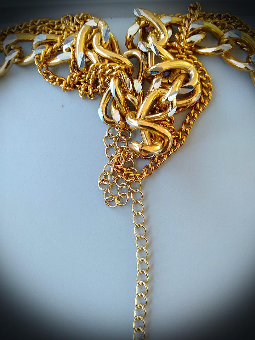 21k Gold tones Cuban hollow (Category: Luxury Accessories) located in Manila. Submitted by mindplanets (Listing ID 214807055, Image 3). Description: Hollow cuban chain half dollar hollow charms jamaica necklace 21k gold tones on hollow chains (only the 3 connector links of charms and shortchain are magnetc), --the general long chains , cubans, and charms, however- all are non magnetic, 47 grams weight.