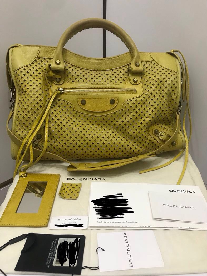 balenciaga perforated bag