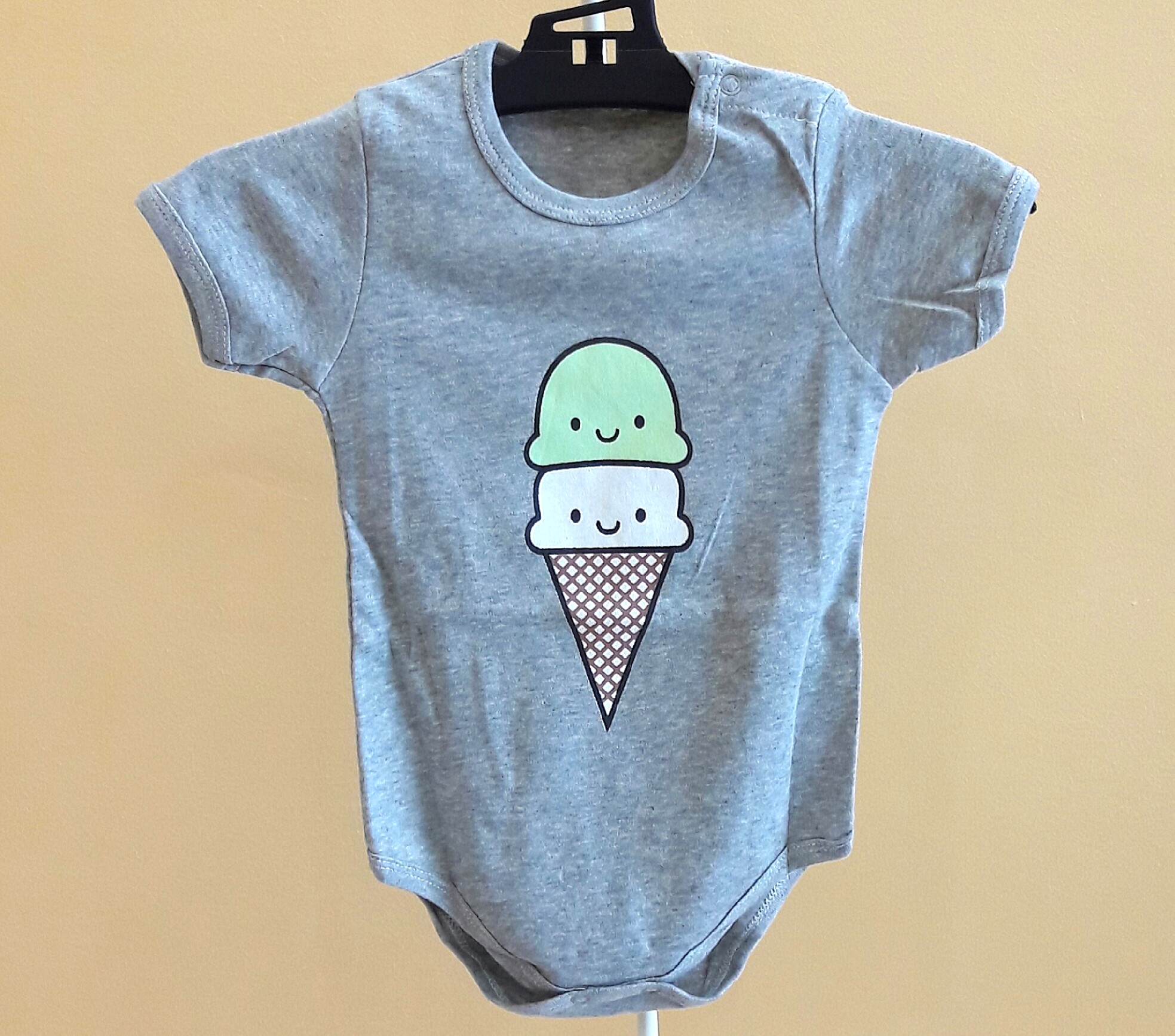 cream baby onesie
