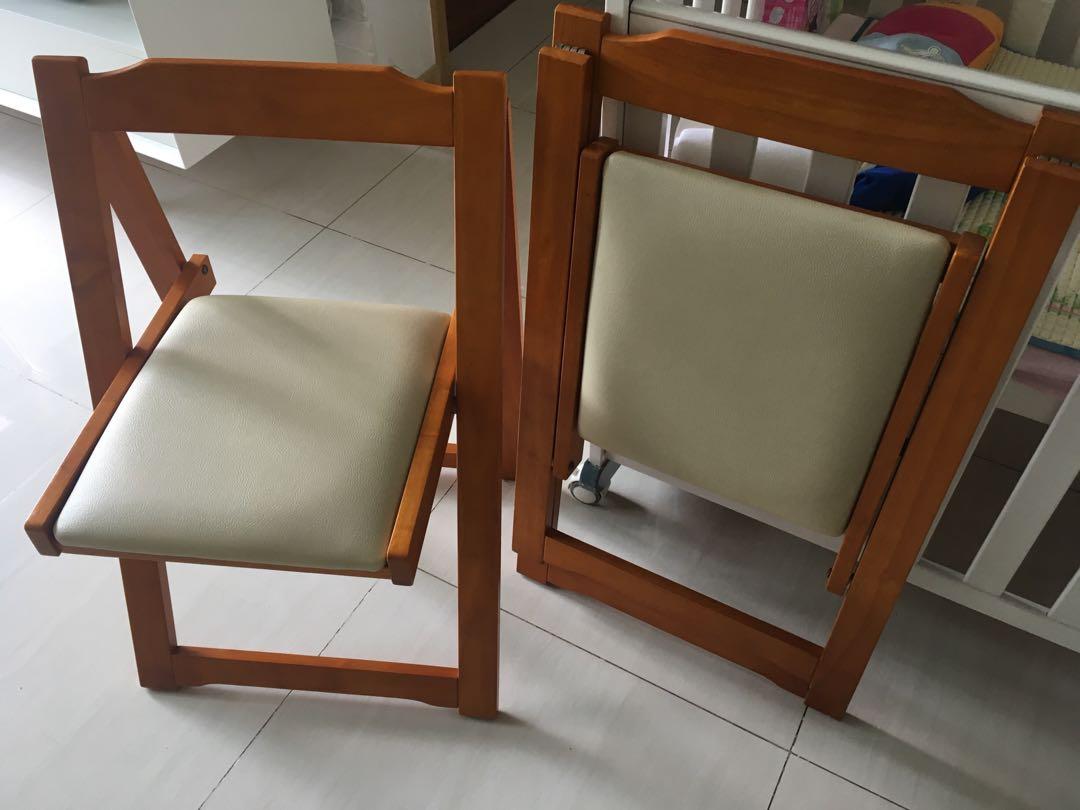 2 wooden foldable dining chairs