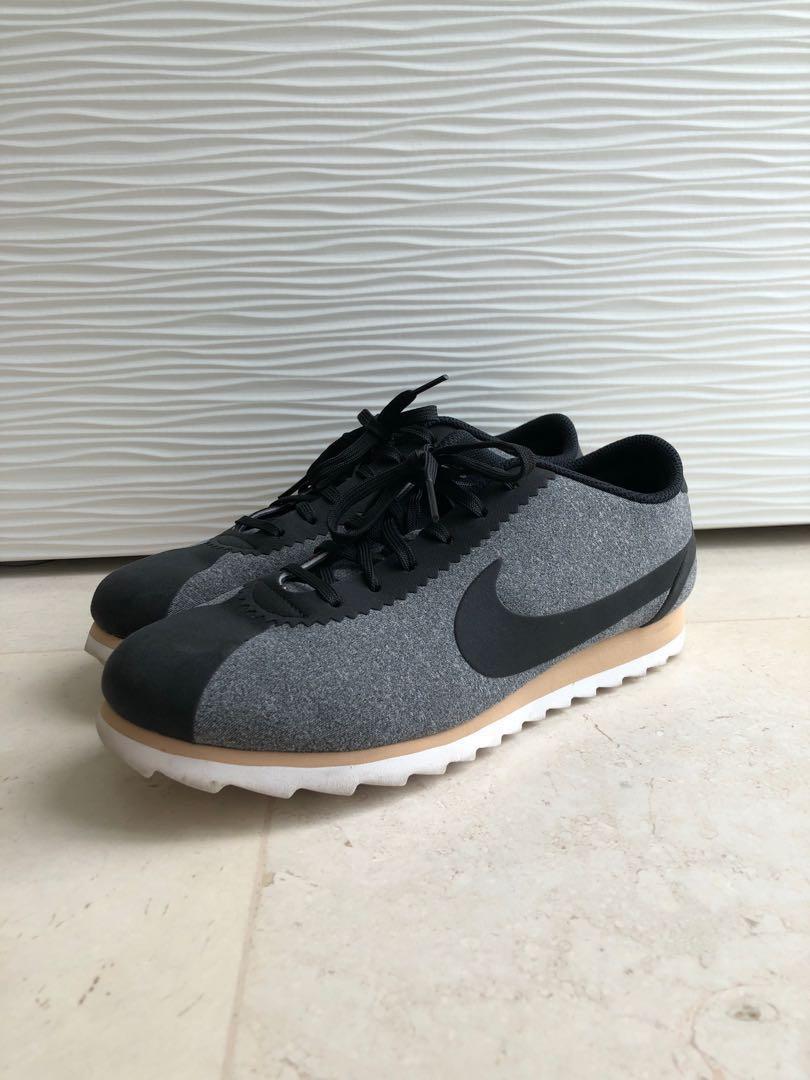 black and gray nike cortez
