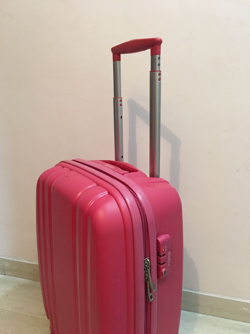 pink hand luggage suitcase