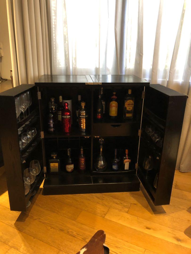 Crate Barrel Steamer Bar Cabinet for quick sale. In good condition