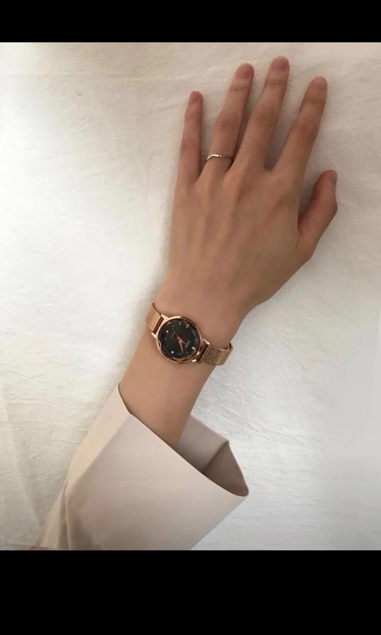 Gold strap black face watch on sale
