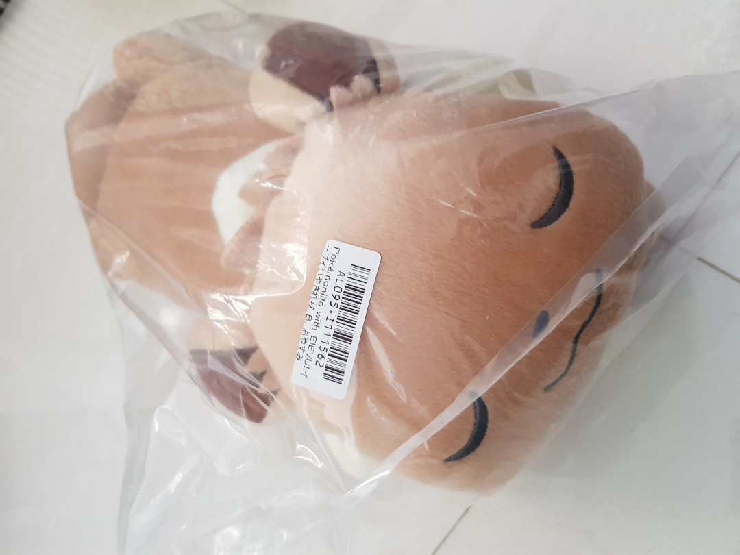 Sleeping eevee plushie pillow, Hobbies & Toys, Toys & Games on Carousell