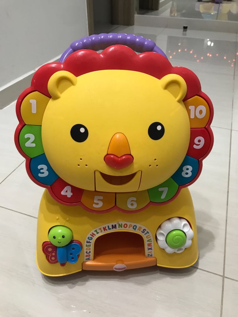 fisher price sit stride ride lion