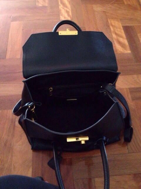 Handbag (Category: Women's Bags & Wallets) located in Bankstown. Submitted by roukya (Listing ID 211453745, Image 3). Description: PRADA bag metal strap damaged on one side & rips inside on both sides ( refer to pictures ^ ).