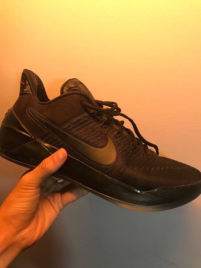 Kobe ad triple black store